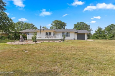 Discover the charm of Briarbrook in this delightful 3-bedroom on Briarbrook Golf Course in Missouri - for sale on GolfHomes.com, golf home, golf lot