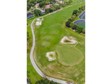 Welcome to this stunning 3/2/2 pool home nestled in sought after on St. Lucie Trail Golf Club in Florida - for sale on GolfHomes.com, golf home, golf lot