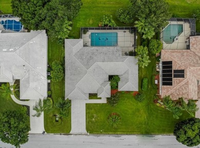 Welcome to this stunning 3/2/2 pool home nestled in sought after on St. Lucie Trail Golf Club in Florida - for sale on GolfHomes.com, golf home, golf lot