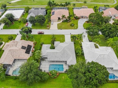 Welcome to this stunning 3/2/2 pool home nestled in sought after on St. Lucie Trail Golf Club in Florida - for sale on GolfHomes.com, golf home, golf lot