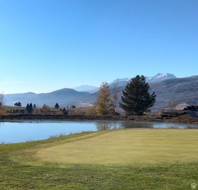 Situated against the ninth hole of the Wolf Creek golf course on Wolf Creek Golf Club and Resort in Utah - for sale on GolfHomes.com, golf home, golf lot