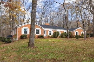 Welcome to this beautiful brick ranch with a walkout basement on Oak Hills Golf and Event Center in North Carolina - for sale on GolfHomes.com, golf home, golf lot