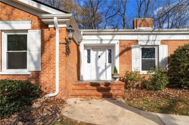 Welcome to this beautiful brick ranch with a walkout basement on Oak Hills Golf and Event Center in North Carolina - for sale on GolfHomes.com, golf home, golf lot