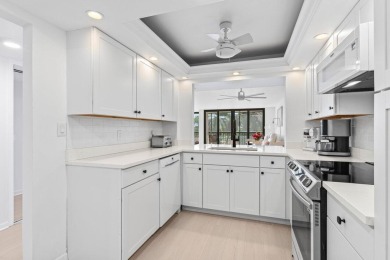 Beautifully renovated 3 bedroom, corner residence in The Glens on The Country Club At Boca Raton in Florida - for sale on GolfHomes.com, golf home, golf lot