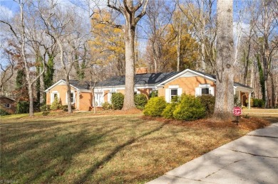 Welcome to this beautiful brick ranch with a walkout basement on Oak Hills Golf and Event Center in North Carolina - for sale on GolfHomes.com, golf home, golf lot