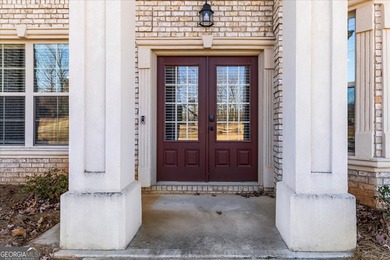 Welcome to luxury living in the gated Crystal Lake community-one on Crystal Lake Golf and Country Club in Georgia - for sale on GolfHomes.com, golf home, golf lot