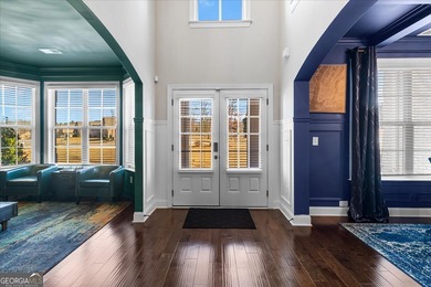 Welcome to luxury living in the gated Crystal Lake community-one on Crystal Lake Golf and Country Club in Georgia - for sale on GolfHomes.com, golf home, golf lot