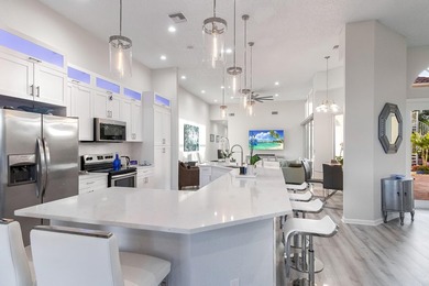 TOTALLY TOTALLY UPDATED A MUST SEE! TRANQUIL COURTYARD HEATED on Wycliffe Golf and Country Club in Florida - for sale on GolfHomes.com, golf home, golf lot