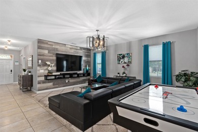 Short walk to The Oasis Club, this beautifully updated vacation on The Oasis Club at Champions Gate in Florida - for sale on GolfHomes.com, golf home, golf lot