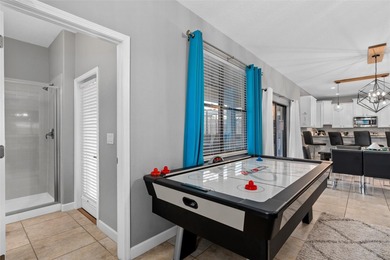 Short walk to The Oasis Club, this beautifully updated vacation on The Oasis Club at Champions Gate in Florida - for sale on GolfHomes.com, golf home, golf lot