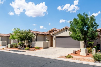 This immaculate single-level home is nestled in the highly on Entrada at Snow Canyon in Utah - for sale on GolfHomes.com, golf home, golf lot