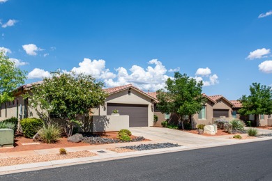 This immaculate single-level home is nestled in the highly on Entrada at Snow Canyon in Utah - for sale on GolfHomes.com, golf home, golf lot