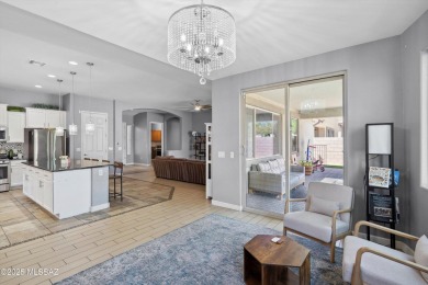 This single-story home in the gated Omni Tucson National resort on Omni Tucson National Golf Resort and Spa - Sonoran in Arizona - for sale on GolfHomes.com, golf home, golf lot