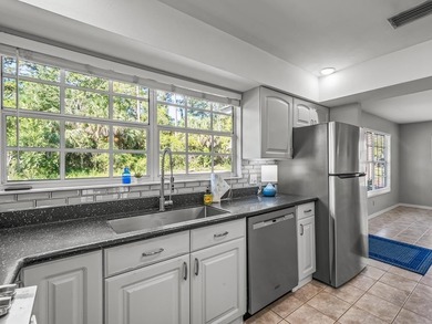 Beautifully maintained 3BR/2BA coastal home on over half an acre on St. James Bay in Florida - for sale on GolfHomes.com, golf home, golf lot