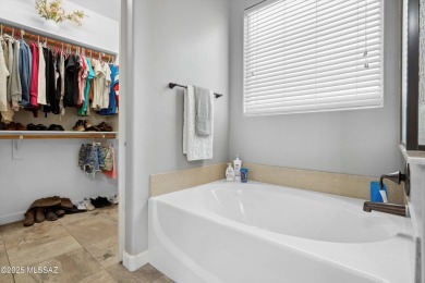 This single-story home in the gated Omni Tucson National resort on Omni Tucson National Golf Resort and Spa - Sonoran in Arizona - for sale on GolfHomes.com, golf home, golf lot