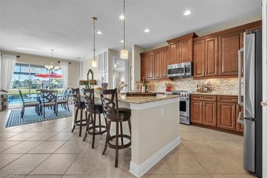 Offered TURNKEY and complete with a 4-seater golf cart, this on River Hall Country Club in Florida - for sale on GolfHomes.com, golf home, golf lot