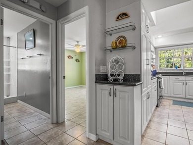 Beautifully maintained 3BR/2BA coastal home on over half an acre on St. James Bay in Florida - for sale on GolfHomes.com, golf home, golf lot