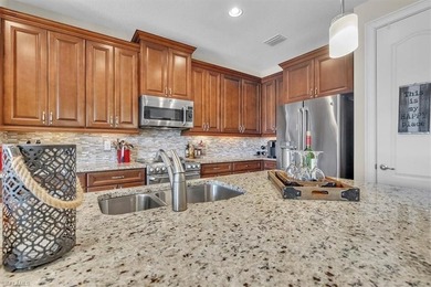 Offered TURNKEY and complete with a 4-seater golf cart, this on River Hall Country Club in Florida - for sale on GolfHomes.com, golf home, golf lot