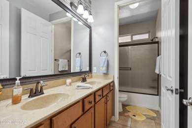 This single-story home in the gated Omni Tucson National resort on Omni Tucson National Golf Resort and Spa - Sonoran in Arizona - for sale on GolfHomes.com, golf home, golf lot