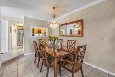 Come experience carefree comfort and a peaceful lifestyle in on Mangrove Bay Golf Course in Florida - for sale on GolfHomes.com, golf home, golf lot