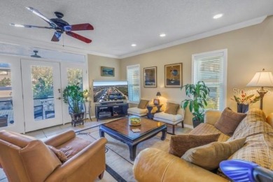 Come experience carefree comfort and a peaceful lifestyle in on Mangrove Bay Golf Course in Florida - for sale on GolfHomes.com, golf home, golf lot