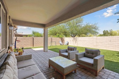 This single-story home in the gated Omni Tucson National resort on Omni Tucson National Golf Resort and Spa - Sonoran in Arizona - for sale on GolfHomes.com, golf home, golf lot