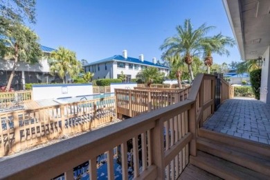 Come experience carefree comfort and a peaceful lifestyle in on Mangrove Bay Golf Course in Florida - for sale on GolfHomes.com, golf home, golf lot