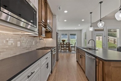 Beautiful like new home in The Greens at Sugar Creek. Discover on Big Sugar Golf Club in Arkansas - for sale on GolfHomes.com, golf home, golf lot