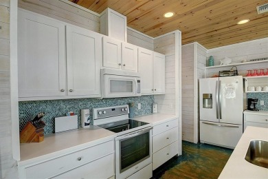 Welcome to Beach Bound! This fabulous 5-bedroom, 4.5-bath on Palmilla Beach Golf Club in Texas - for sale on GolfHomes.com, golf home, golf lot