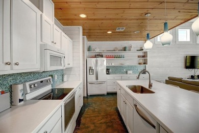 Welcome to Beach Bound! This fabulous 5-bedroom, 4.5-bath on Palmilla Beach Golf Club in Texas - for sale on GolfHomes.com, golf home, golf lot