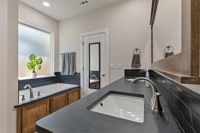 Beautiful like new home in The Greens at Sugar Creek. Discover on Big Sugar Golf Club in Arkansas - for sale on GolfHomes.com, golf home, golf lot