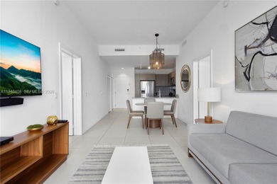 Experience penthouse living with golf course views from this on Doral Golf Resort in Florida - for sale on GolfHomes.com, golf home, golf lot