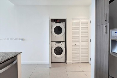 Experience penthouse living with golf course views from this on Doral Golf Resort in Florida - for sale on GolfHomes.com, golf home, golf lot