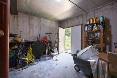 Welcome to this stunning 1.5-story home nestled on a quiet on Staley Farms Golf Club in Missouri - for sale on GolfHomes.com, golf home, golf lot