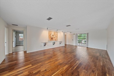 Exceptional opportunity to own this Palm Aire Country Club villa on Palm Aire Country Club of Sarasota in Florida - for sale on GolfHomes.com, golf home, golf lot