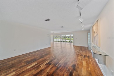 Exceptional opportunity to own this Palm Aire Country Club villa on Palm Aire Country Club of Sarasota in Florida - for sale on GolfHomes.com, golf home, golf lot