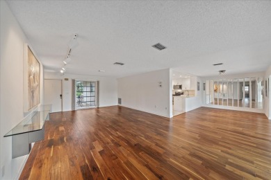 Exceptional opportunity to own this Palm Aire Country Club villa on Palm Aire Country Club of Sarasota in Florida - for sale on GolfHomes.com, golf home, golf lot