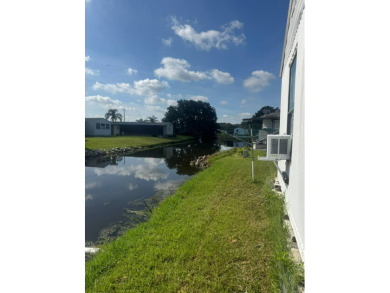 Nicely updated home with newer kitchen appliances, washer/dryer on Golden Lakes Golf Course in Florida - for sale on GolfHomes.com, golf home, golf lot