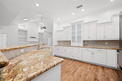 Move right into this beautifully appointed four bedroom, two on Haile Plantation Golf and Country Club in Florida - for sale on GolfHomes.com, golf home, golf lot