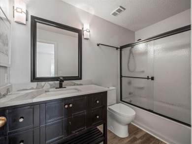 Beautifully updated 2 bedroom, 2 bath condo with a large balcony on Hunters Green Country Club in Florida - for sale on GolfHomes.com, golf home, golf lot