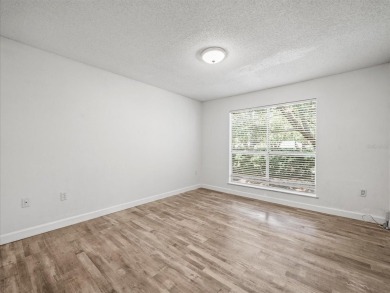 Beautifully updated 2 bedroom, 2 bath condo with a large balcony on Hunters Green Country Club in Florida - for sale on GolfHomes.com, golf home, golf lot