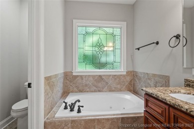 Welcome Home to a beautiful two-story home in Anderson Creek on Anderson Creek Golf Club in North Carolina - for sale on GolfHomes.com, golf home, golf lot