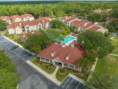 Beautifully updated 2 bedroom, 2 bath condo with a large balcony on Hunters Green Country Club in Florida - for sale on GolfHomes.com, golf home, golf lot