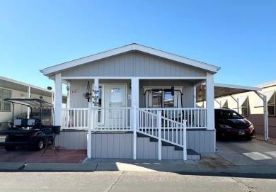 Welcome to this beautifully renovated and meticulously on Voyager RV Resort and Golf Course in Arizona - for sale on GolfHomes.com, golf home, golf lot