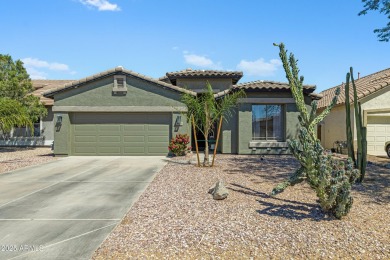 This delightful single-story residence offers 3 spacious on The Golf Club At Johnson Ranch in Arizona - for sale on GolfHomes.com, golf home, golf lot