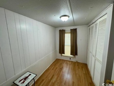Looking for an affordable beach getaway or primary residence on Indian Wells Golf Course in South Carolina - for sale on GolfHomes.com, golf home, golf lot