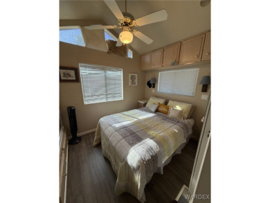 Charming home with versatile Arizona room has a completely on Riverview Golf Course in Arizona - for sale on GolfHomes.com, golf home, golf lot