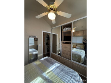 Charming home with versatile Arizona room has a completely on Riverview Golf Course in Arizona - for sale on GolfHomes.com, golf home, golf lot