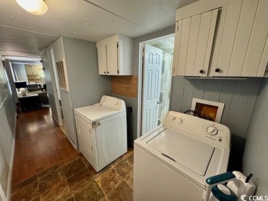 Looking for an affordable beach getaway or primary residence on Indian Wells Golf Course in South Carolina - for sale on GolfHomes.com, golf home, golf lot