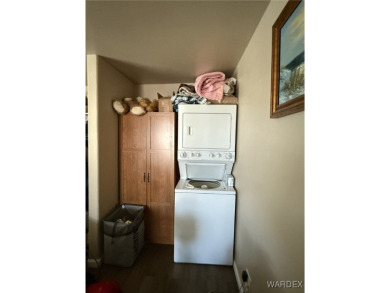 Charming home with versatile Arizona room has a completely on Riverview Golf Course in Arizona - for sale on GolfHomes.com, golf home, golf lot